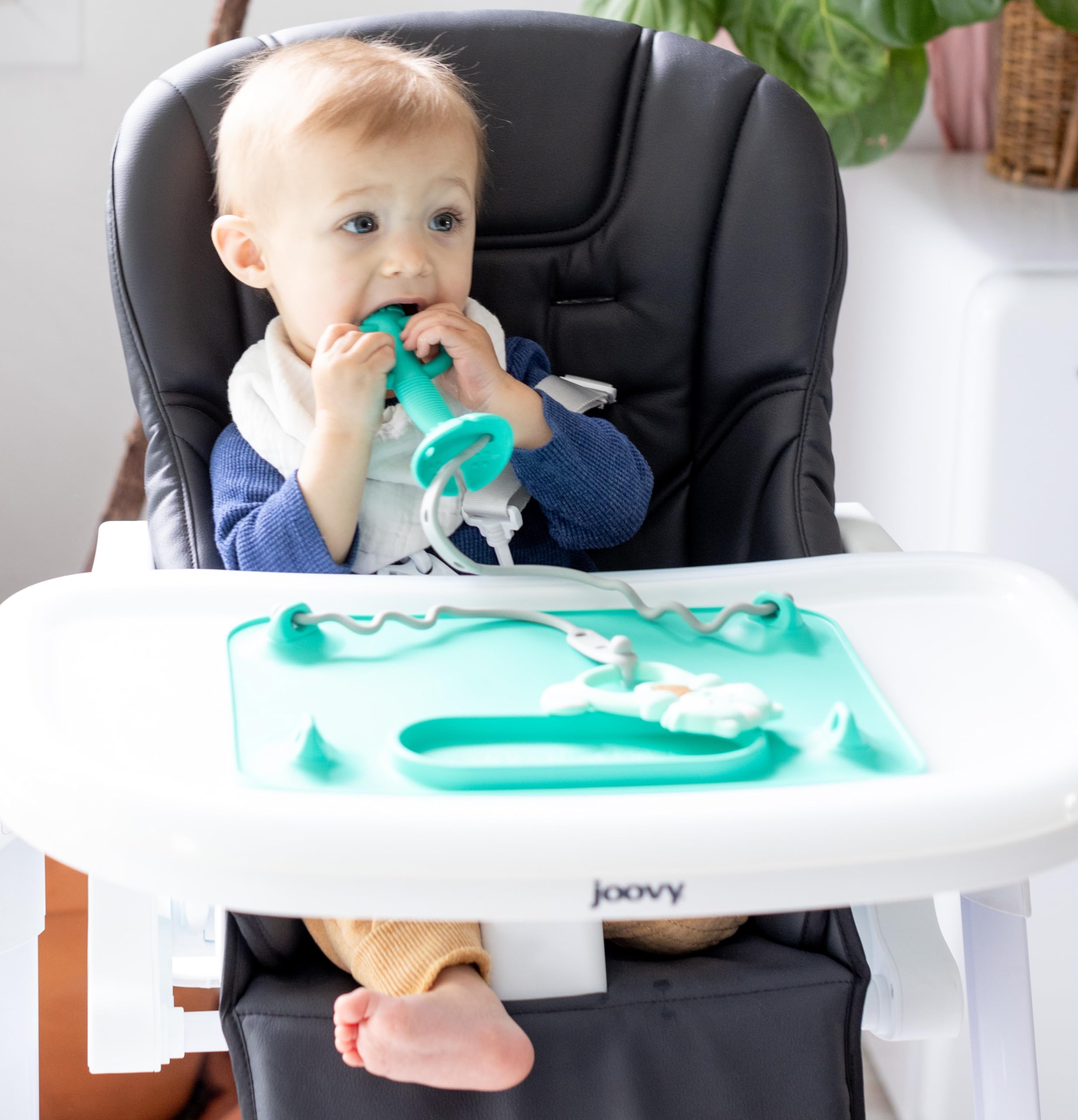 Busy Baby teething spoon textured grip image emphasizes motor skill development.