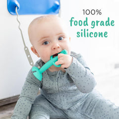 Busy Baby teething spoon with textured handle demonstrates easy self-feeding grip.
