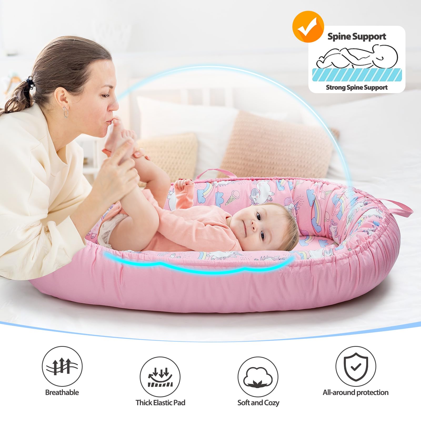 BUTOA Baby Lounger with handles shows portability for home or travel.