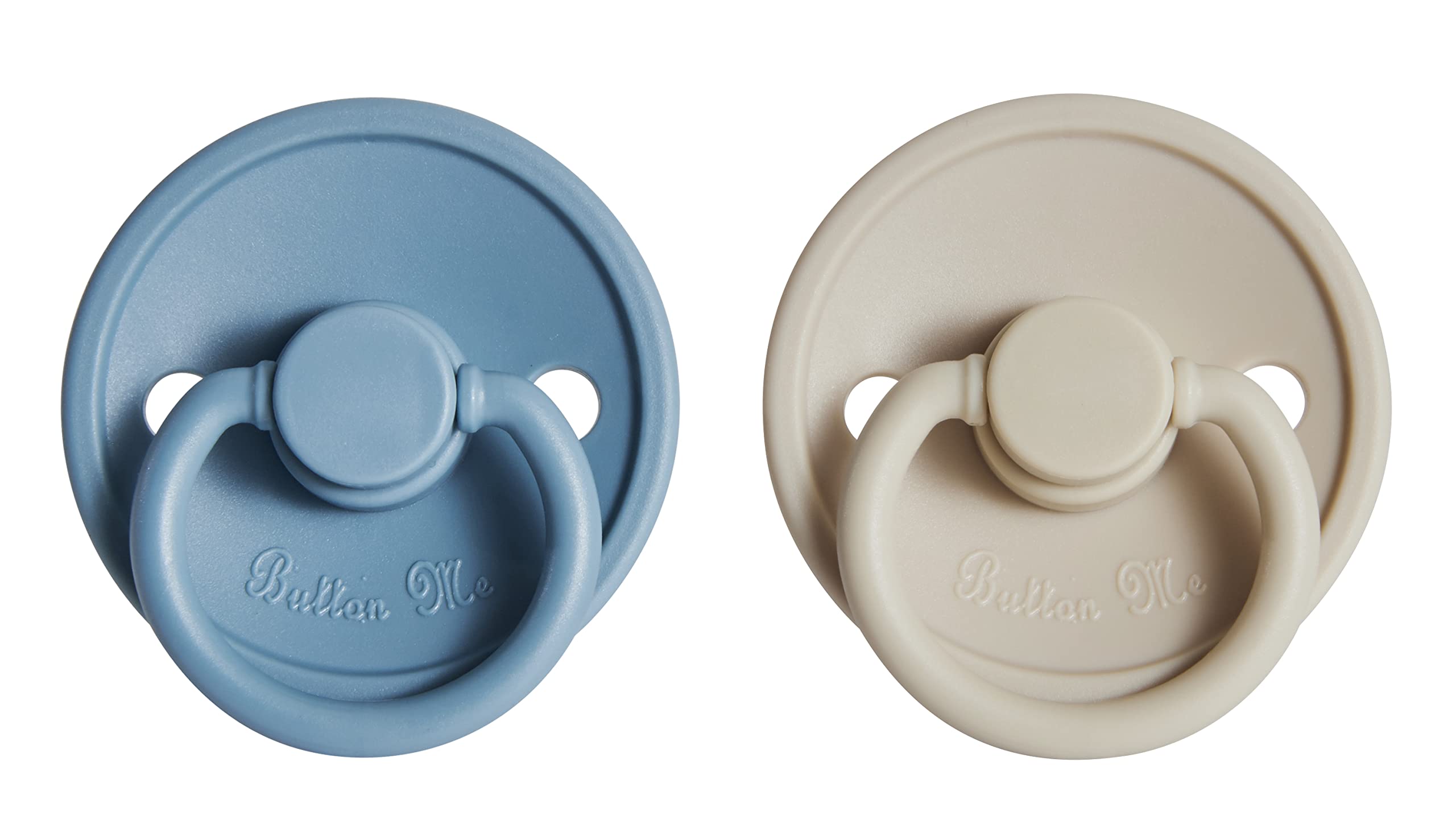Button Me pacifier nipple closeup in soft silicone highlights a gentle, realistic shape for calming comfort.