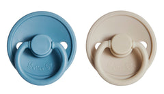 Button Me pacifier nipple closeup in soft silicone highlights a gentle, realistic shape for calming comfort.