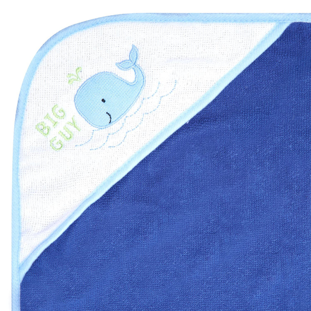 Buttons & Stitches Blue Whale hooded towels hood detail, helps keep baby warm after baths.