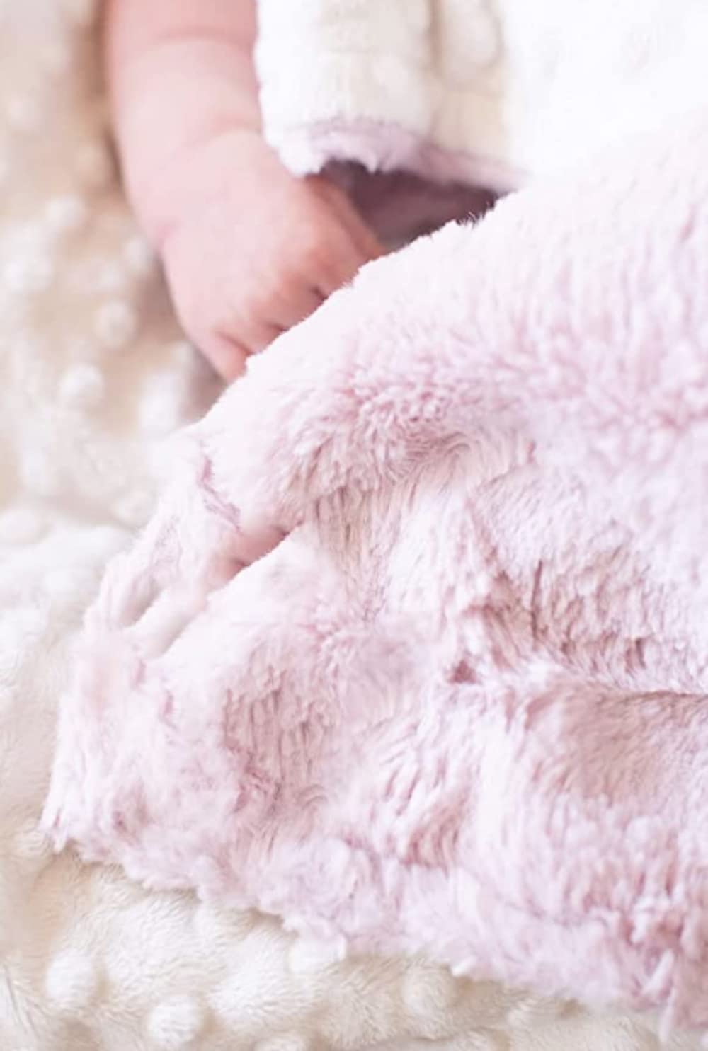 Buttzo baby blanket lightweight warmth conveys breathable comfort for all seasons.