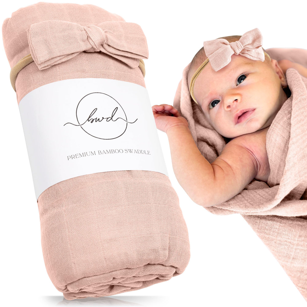 Baby Want Designs premium swaddle in dusty blush folded, highlighting ultra-soft material for newborn comfort.