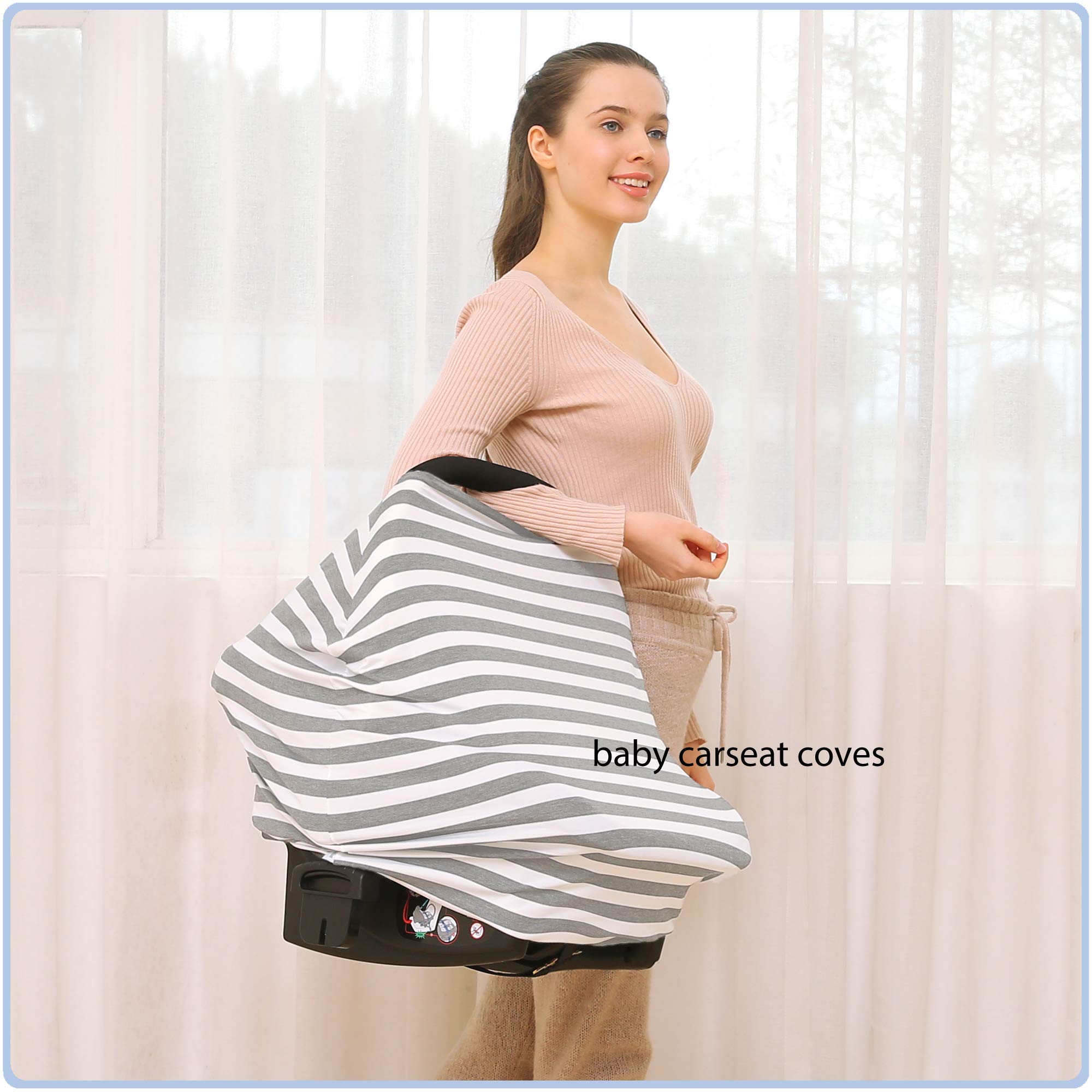 ByeBye Calorie car seat cover in use as a breastfeeding or nursing cover for discreet feeds.