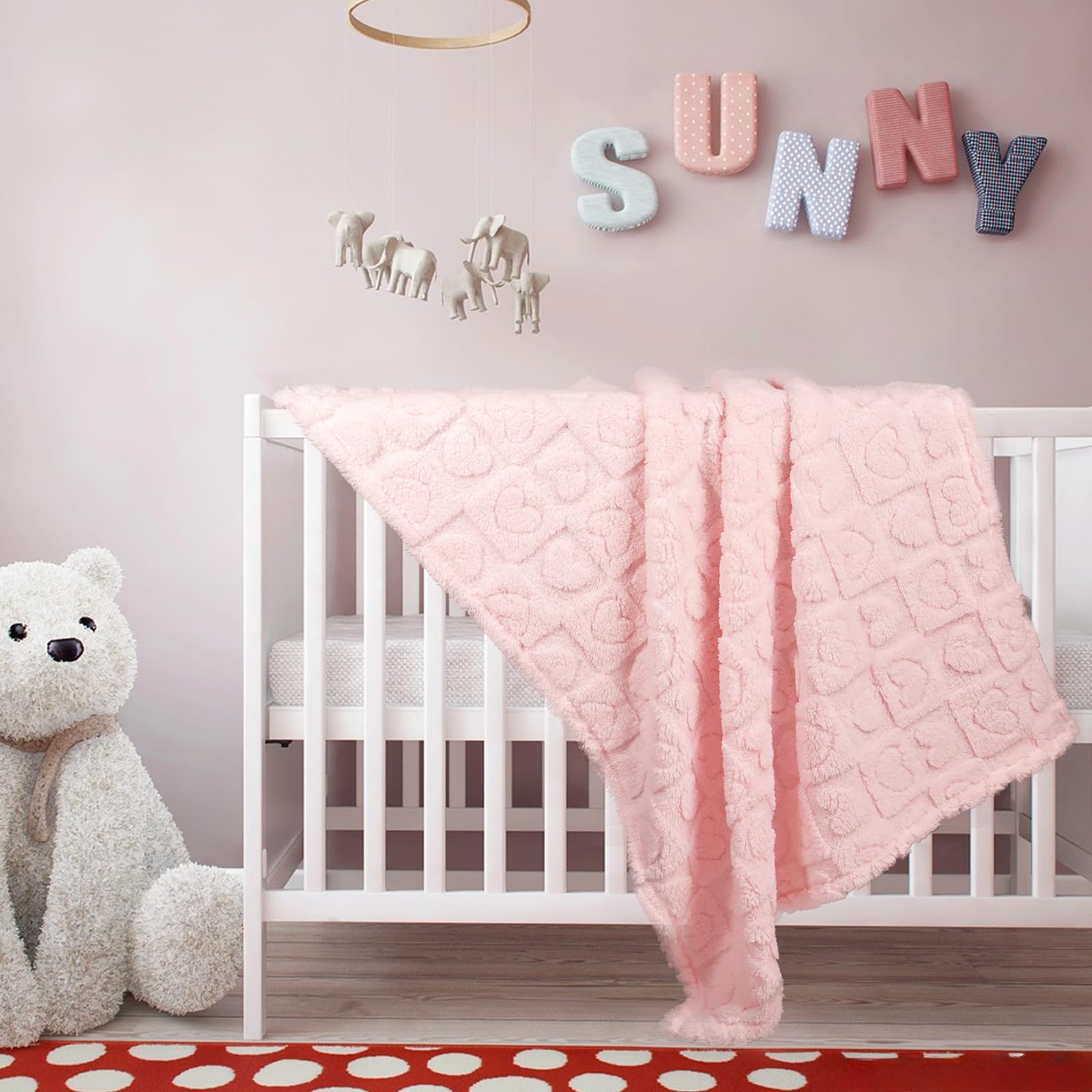 BYKOSY blanket folded in a diaper bag for ultra-portable warmth.
