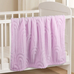 BYKOSY Rainbow blanket in crib display showing soft plush fabric.