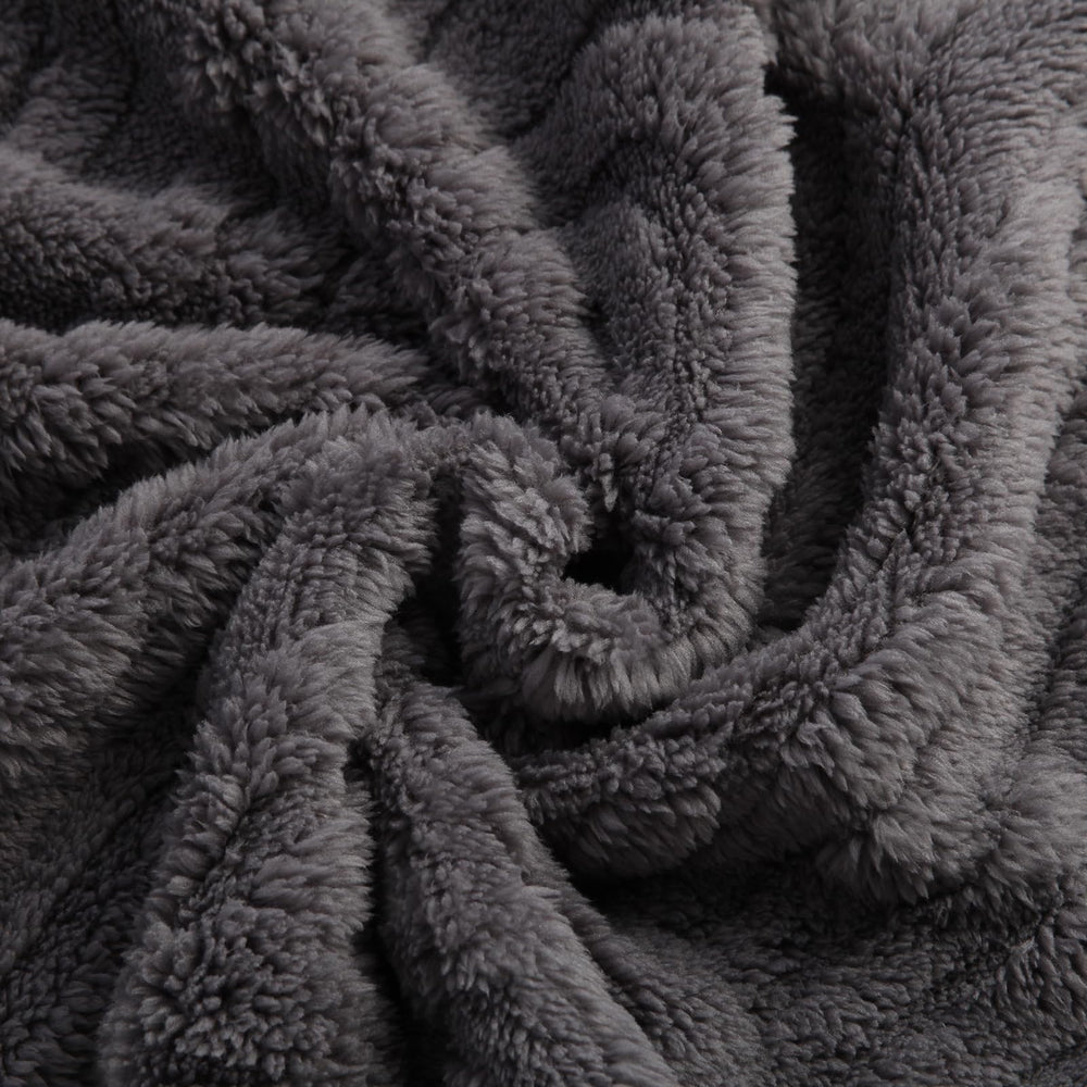 BYKOSY fleece baby blanket swaddling in crib, breathable warmth for year-round comfort.