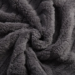 BYKOSY fleece baby blanket swaddling in crib, breathable warmth for year-round comfort.