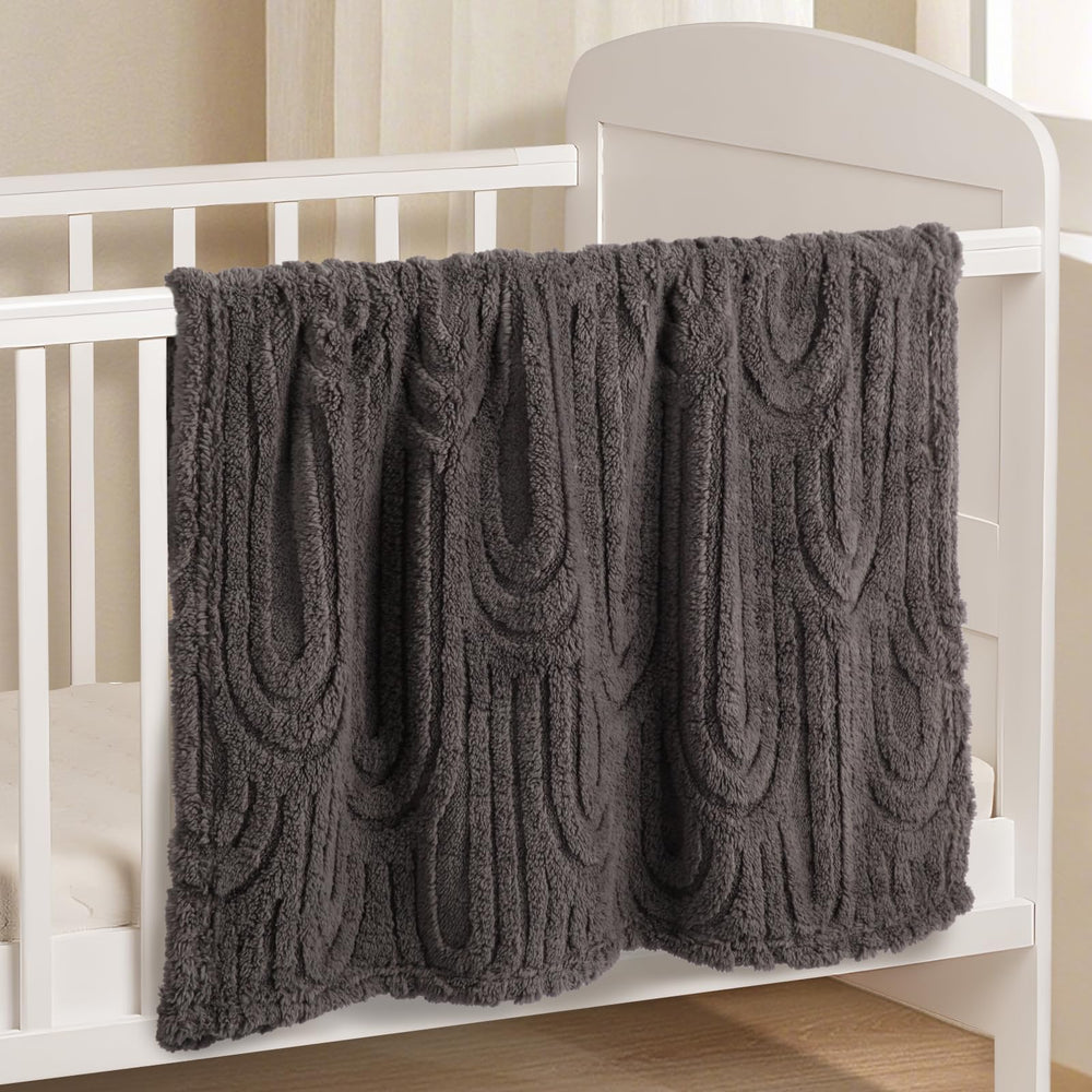 BYKOSY Ultra Soft Fleece Blanket spread as stroller blanket for on-the-go naps.