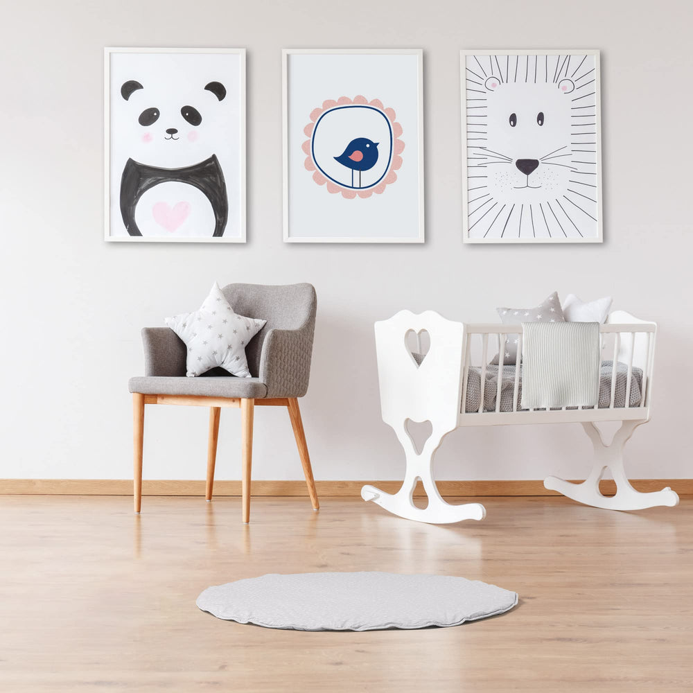Byrd and Blume round baby play mat gray reversible design offers two looks.