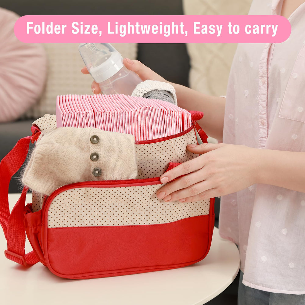 Cabaubl travel-use scene, changing pads in a diaper bag for outings.