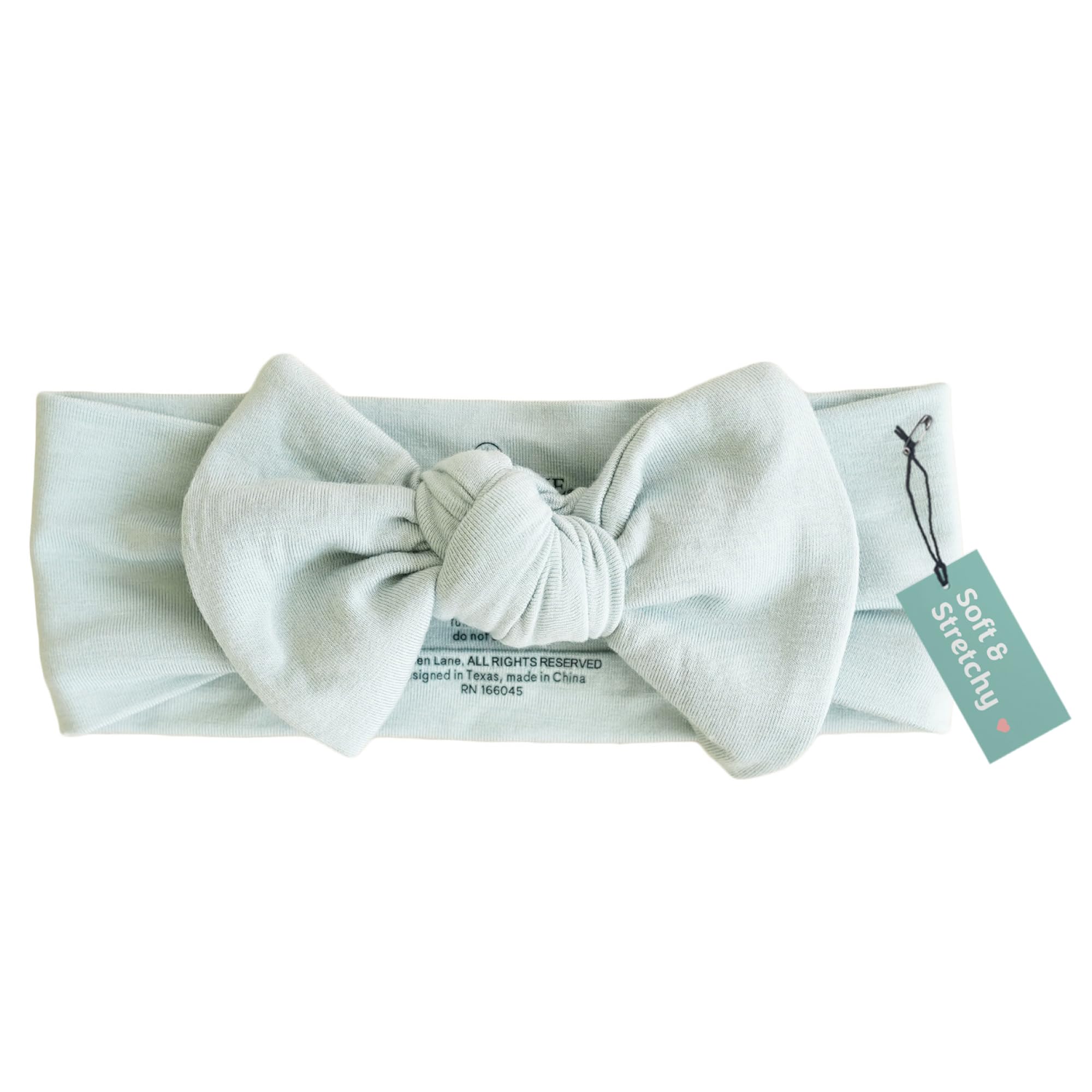 Caden Lane baby headwrap knotted bow Lily Pad Green, gentle fit for delicate skin.