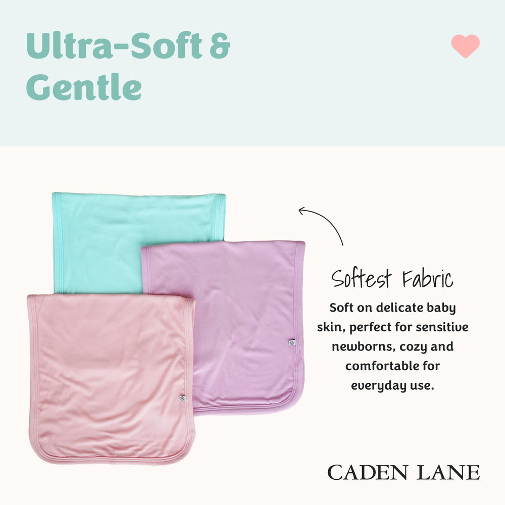 Caden Lane burp cloths oversized-coverage demonstrates superior mess protection during feeds.