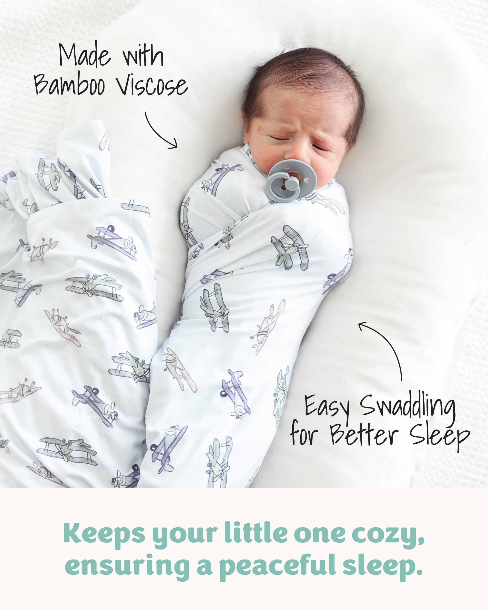 Caden Lane blanket displays solids and prints options to match nursery decor.