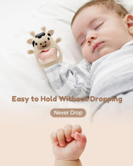 CAHILON teether mitten baby holding demonstrates easy grip and self soothing potential