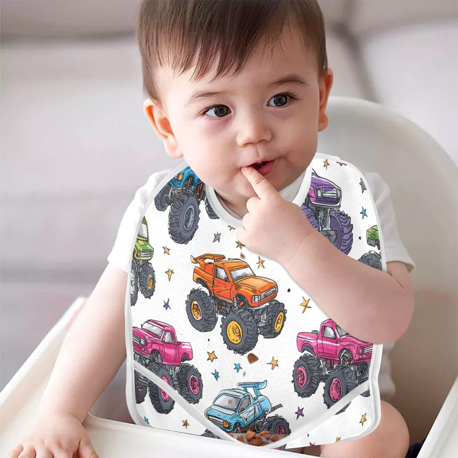 Caikeny baby feeding bib worn by toddler during meals.