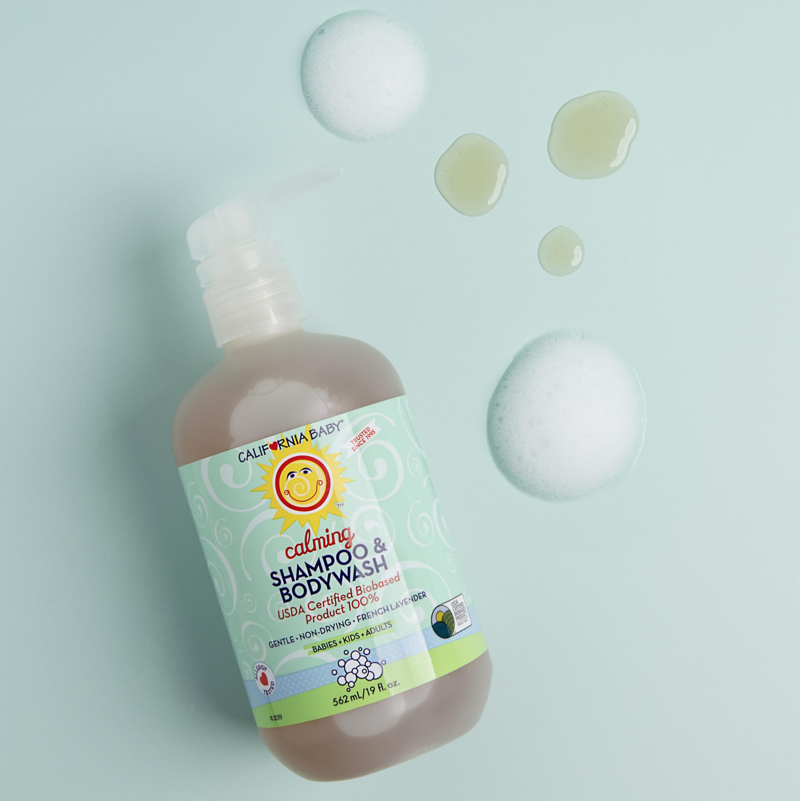 California Baby Calming bottle lavender essentials highlights soothing fragrance in use.