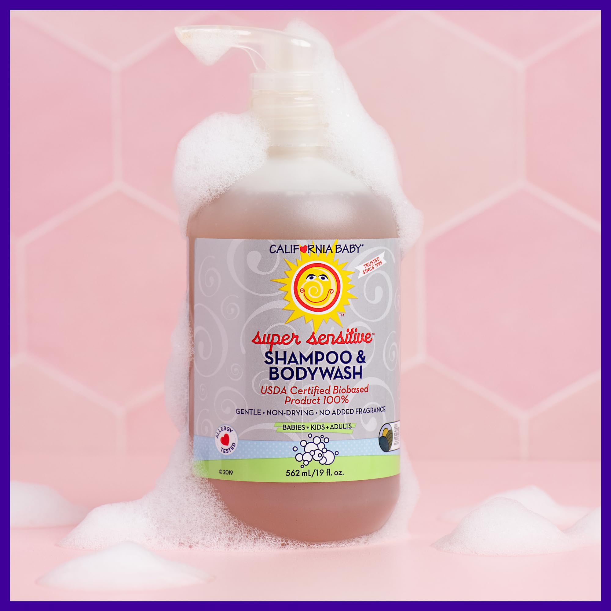California Baby fragrance-free shampoo texture close-up - gentle lather without fragrance.