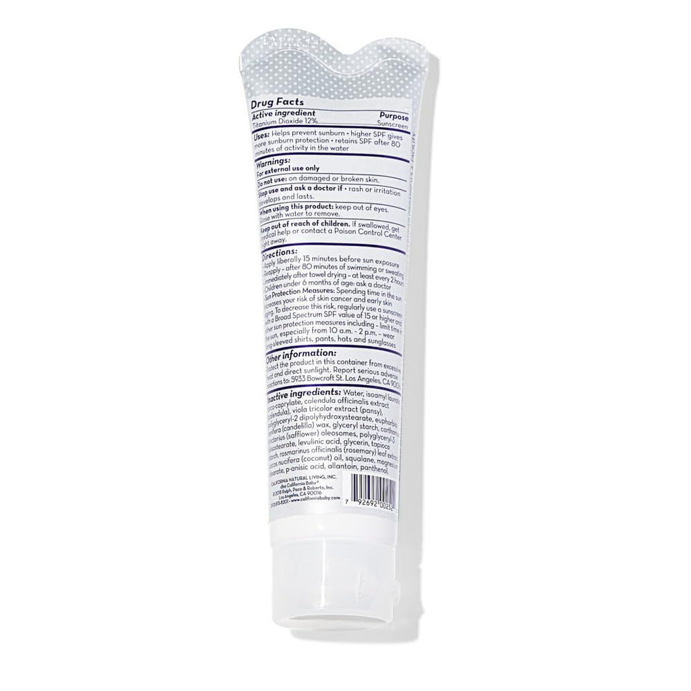 California Baby unscented sunscreen travel-size bottle on a neutral background.