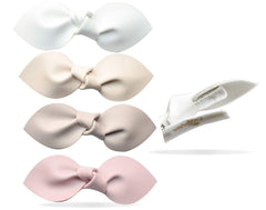 California Tot ivory bow clip on a baby hairstyle for versatile everyday wear.