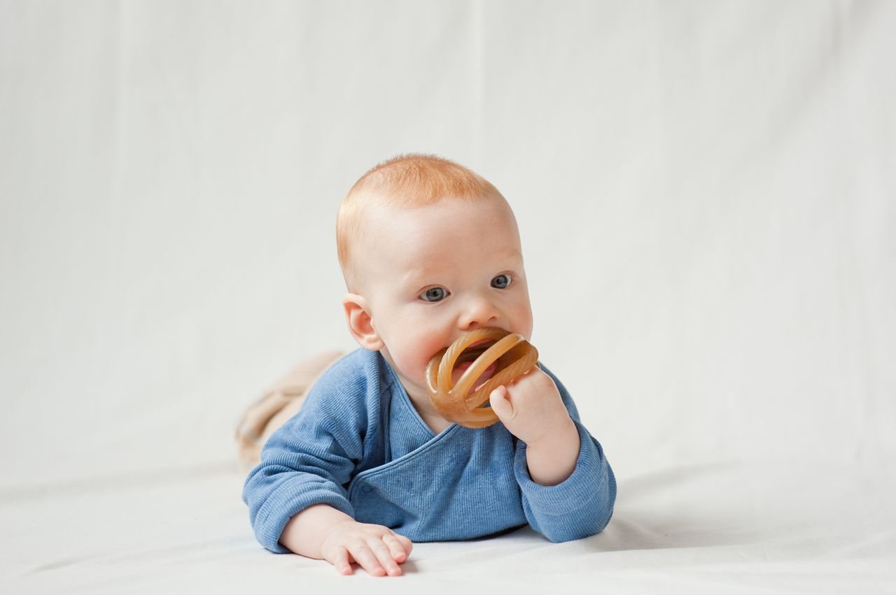 Calmies teether unscented packaging emphasizes safe design for newborn use.