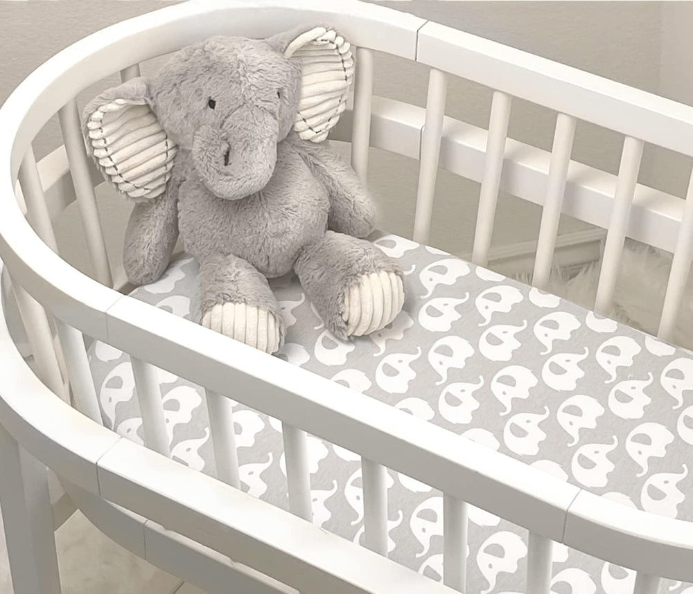Cambria Baby bassinet sheets fit halo-snoo-style grey, secure fit across standard bassinet shapes.