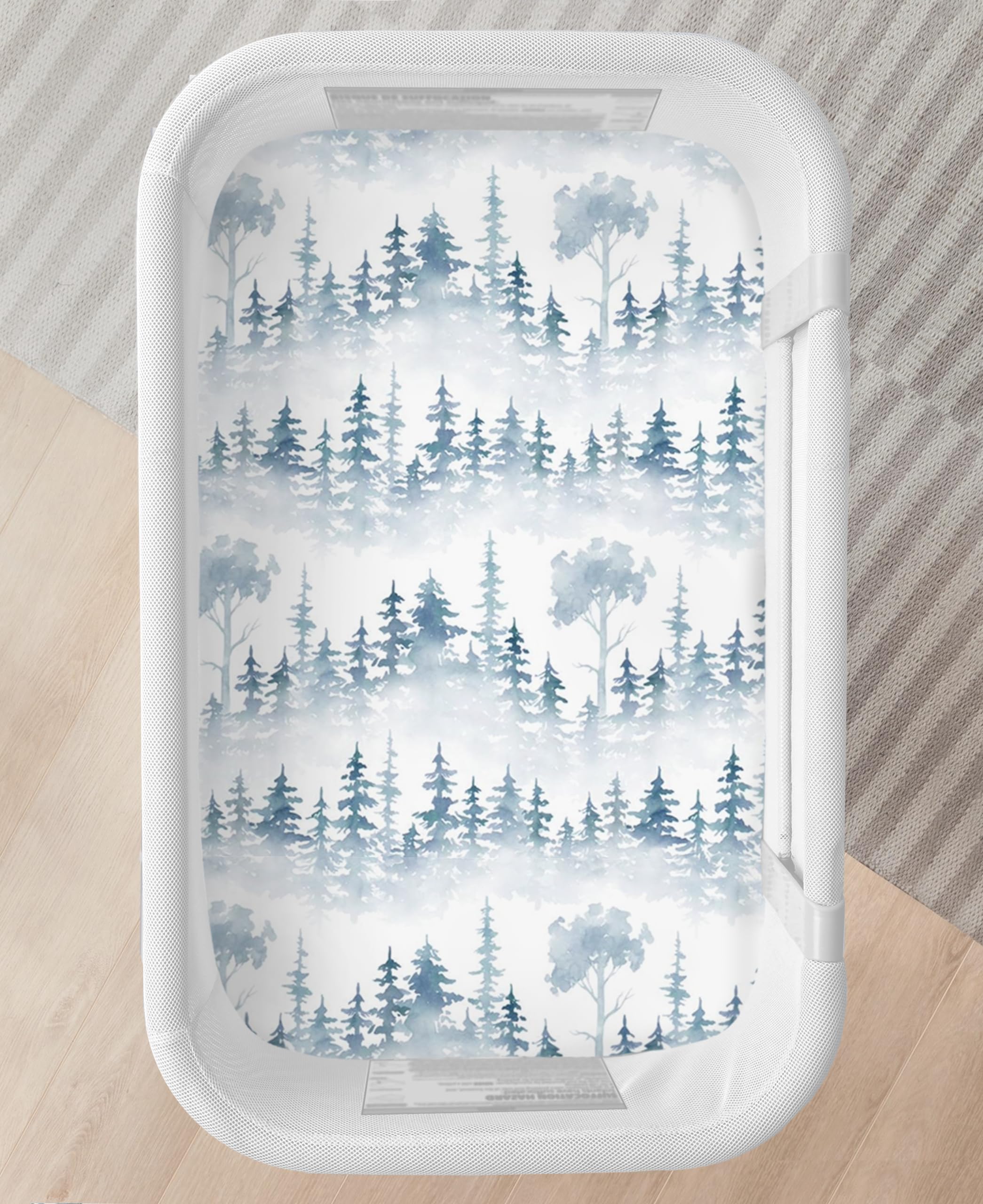 Cambria Baby forest sheet carries India-made label signaling ethical production.