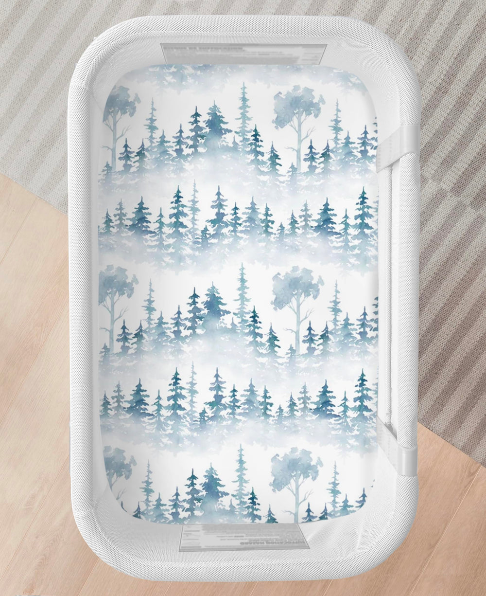 Cambria Baby forest sheet carries India-made label signaling ethical production.