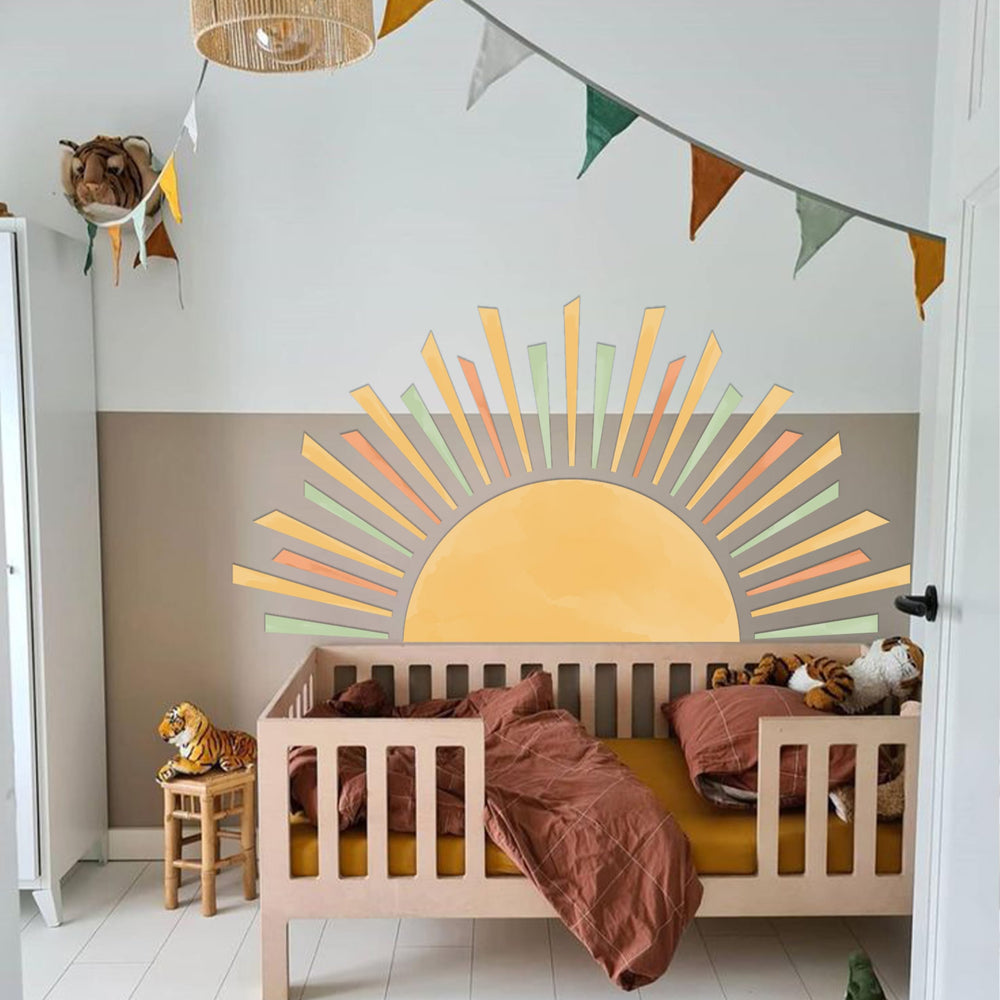 Cantly half-sun decal playroom demonstrates versatile placement for photos and decor.
