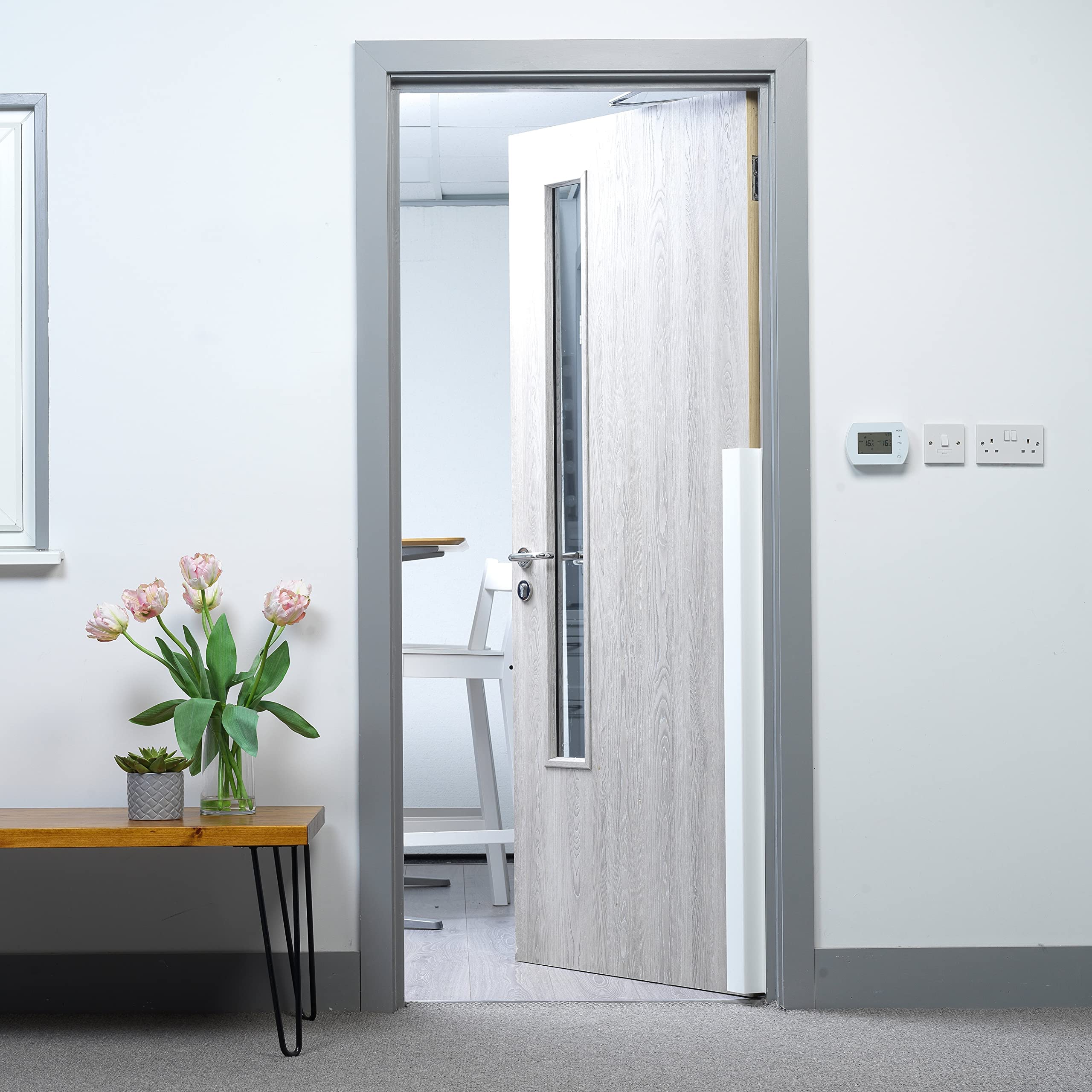 Cardea Solutions guard with nitrile flexible sections adapts around hinges