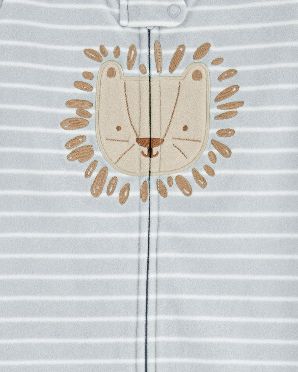 Carter's blue lion sleep bag showing safety tab away from baby's face