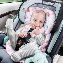 CARUILI head-support cushion pink dots keeps baby's head aligned during car trips.