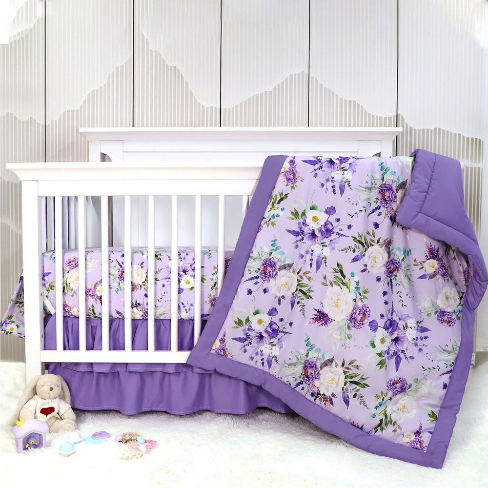 CARUILI purple floral crib pattern adds a dreamy touch to a baby girl nursery.