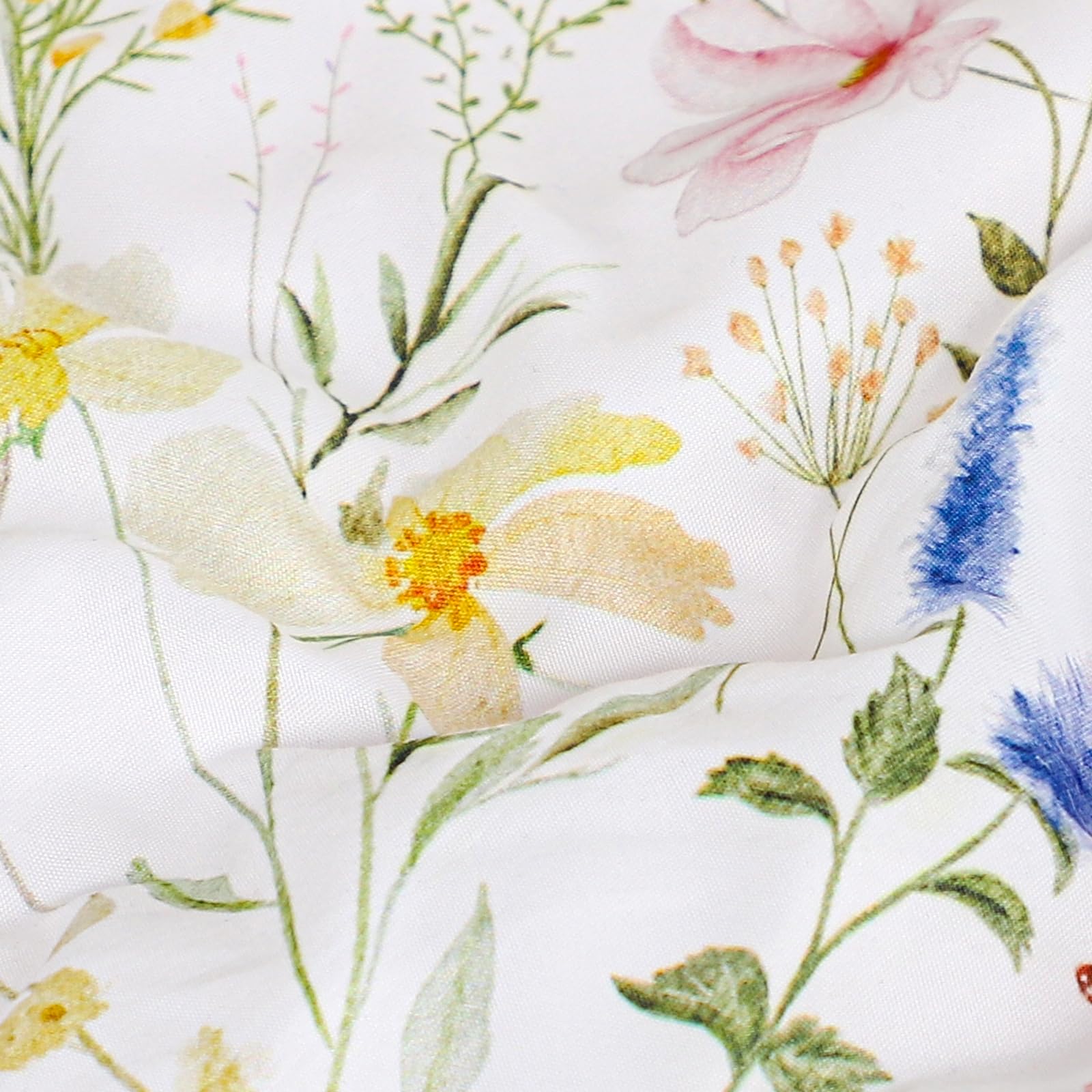 CARUILI bed ensemble view with soft colors and floral motif