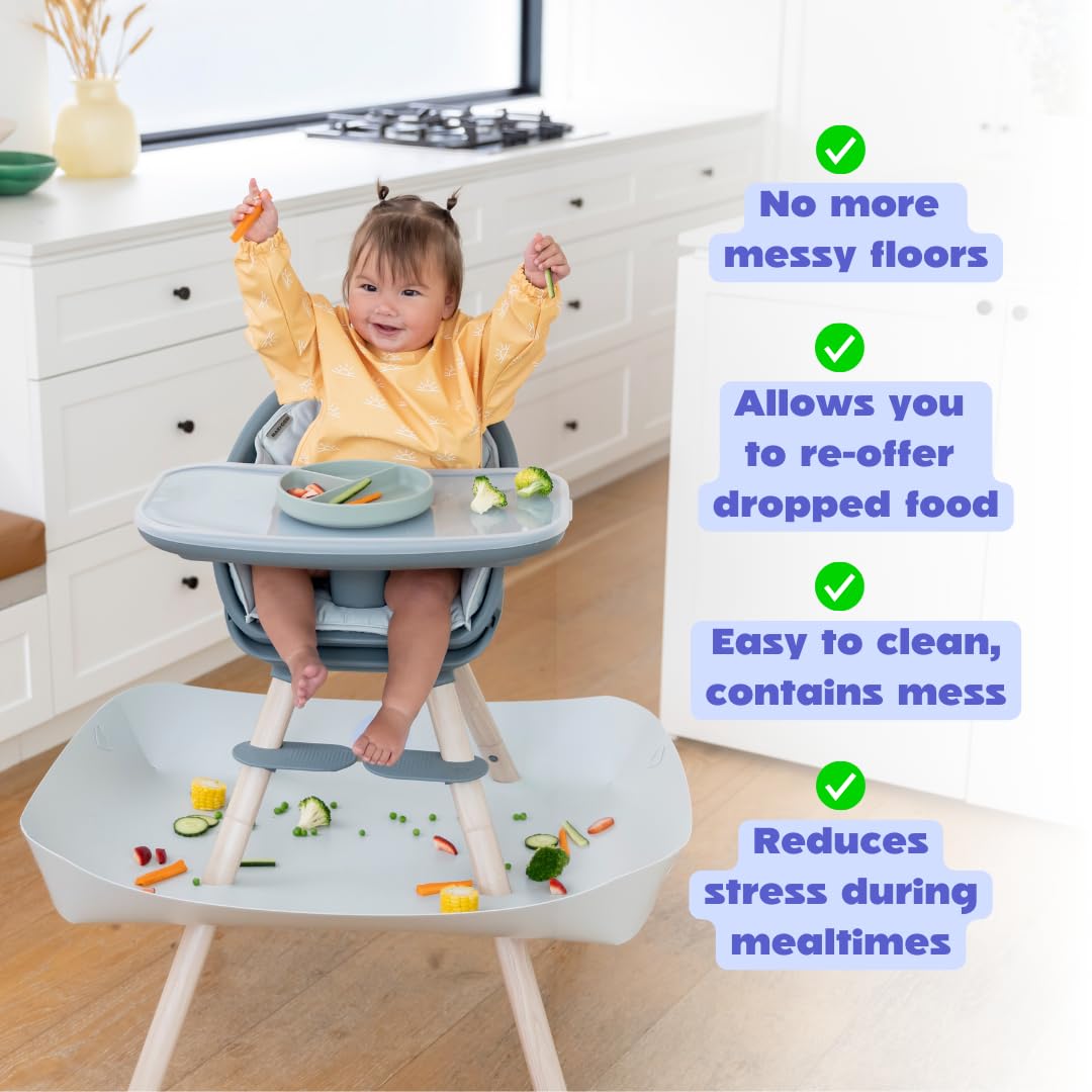 Catchy Food Catcher catches food mess, protecting floors and carpets.