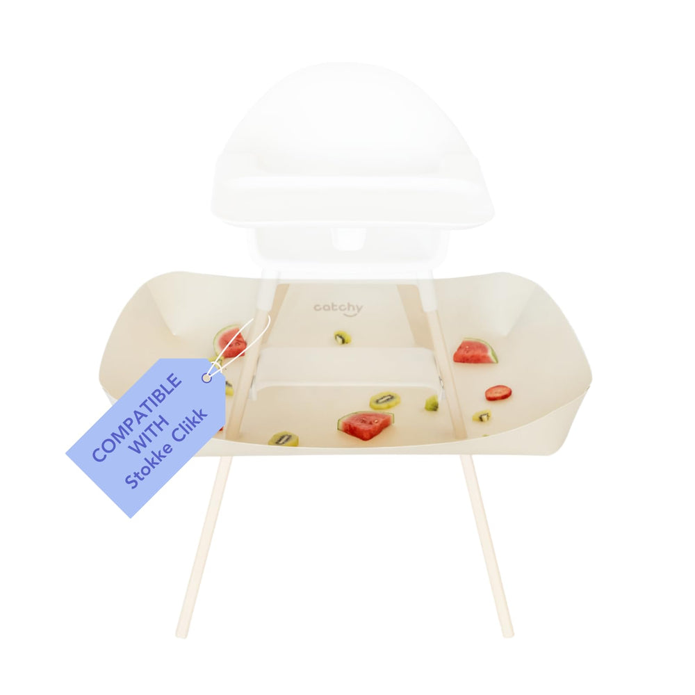 Catchy Food Catcher fits Stokke Clikk, contains spills during meals for easier cleanup.