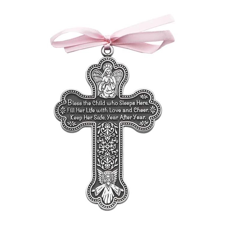 Cathedral Art CM7 cross crib medal hanging from pink satin ribbon in nursery.