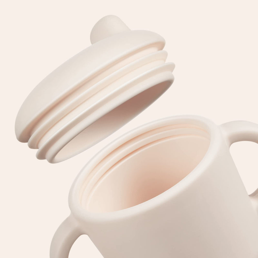 Catii green cup with sealed leak-resistant straw design to reduce spills.
