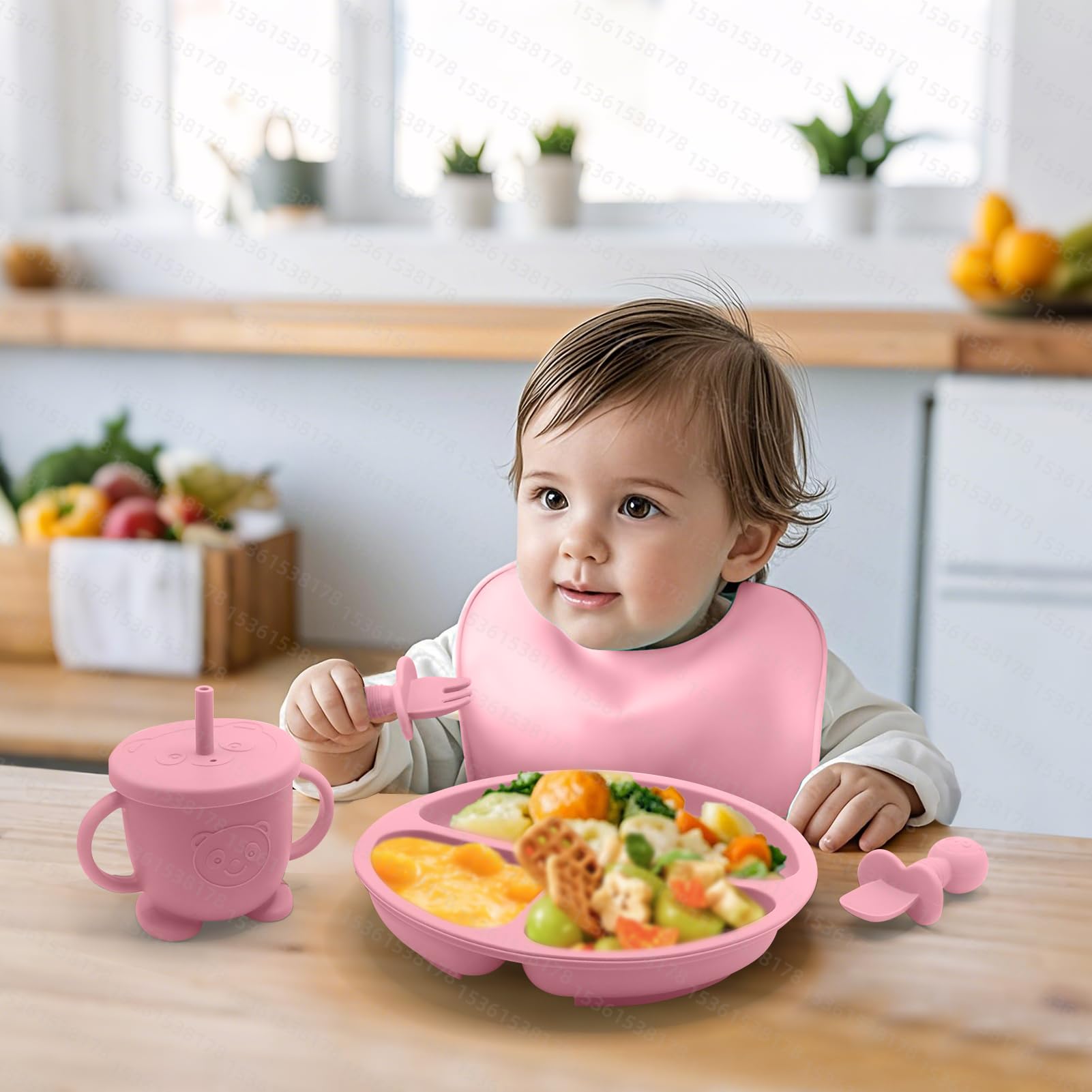 Catvegue mini silicone spoon and fork in pink for tiny hands and gentle texture exploration.