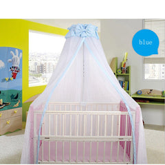 CdyBox crib net blue draped over a cradle creates a cozy canopy.