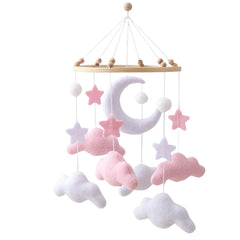 Ceecolia gray pink cloud moon mobile assembly shows handmade charm for a cozy nursery ambiance.