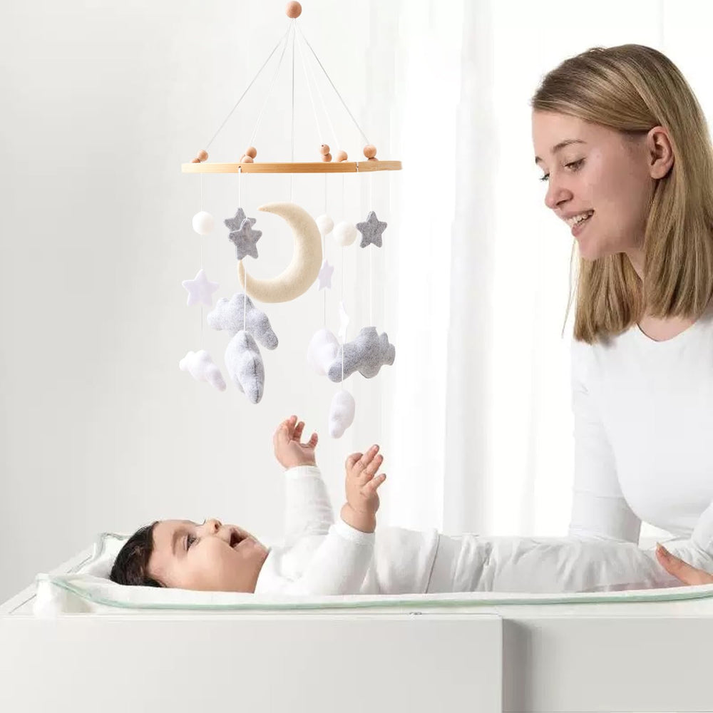 Ceecolia soft gray white mobile blends with nursery decor and fosters a calming atmosphere.