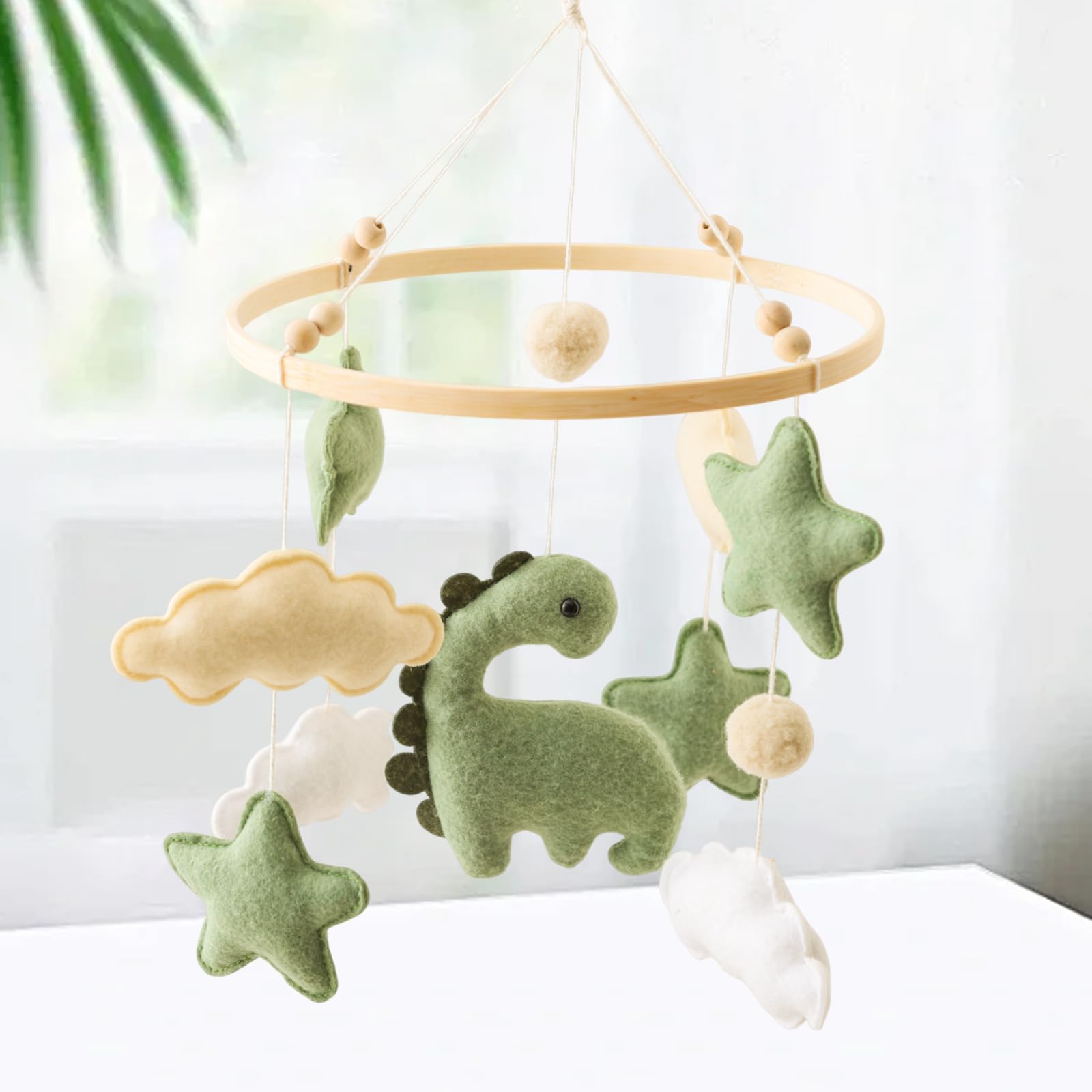 Ceecolia yarn pom-poms mobile adds soft varied textures for sensory development.
