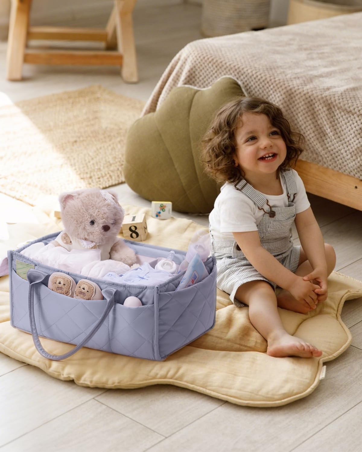 CEI-CEI diaper caddy shows eight external pockets for quick pacifier and wipe access.