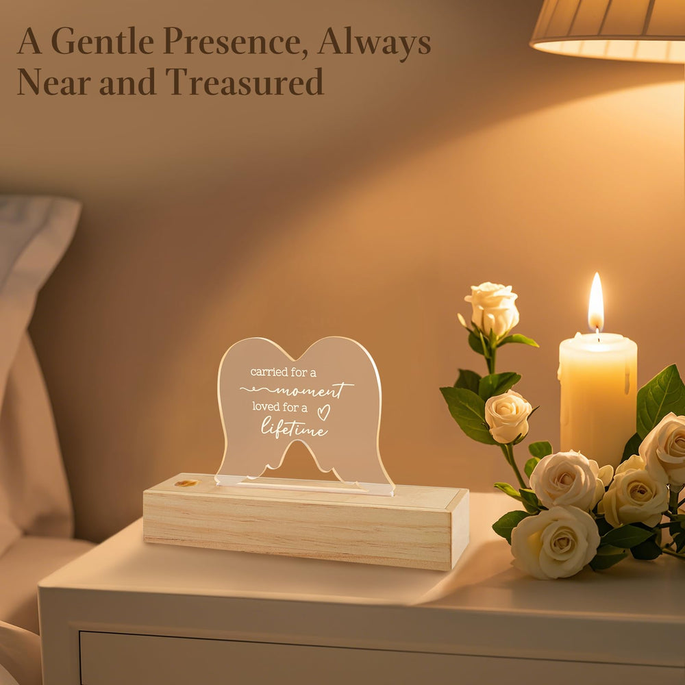 Ceiner angel wings design conveys gentle protection and remembrance.