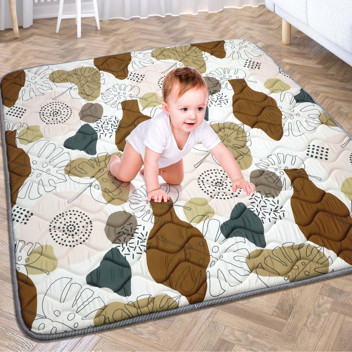 Ceinioc baby play mat close-up shows soft padding for cushioned playtime