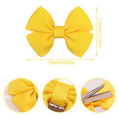 CellElection grosgrain ribbon 2inch bows show durable alligator clips for gentle baby hair.