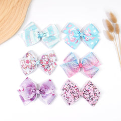 CellElection baby girls bows with alligator clips stay in place for ponytails and braids.