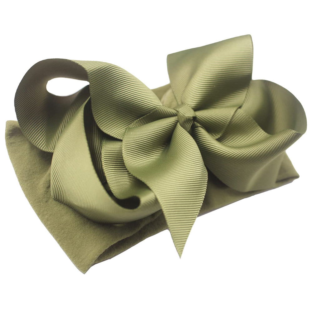 CellElection peach bow headband on soft nylon band, easy fit for growing toddlers.